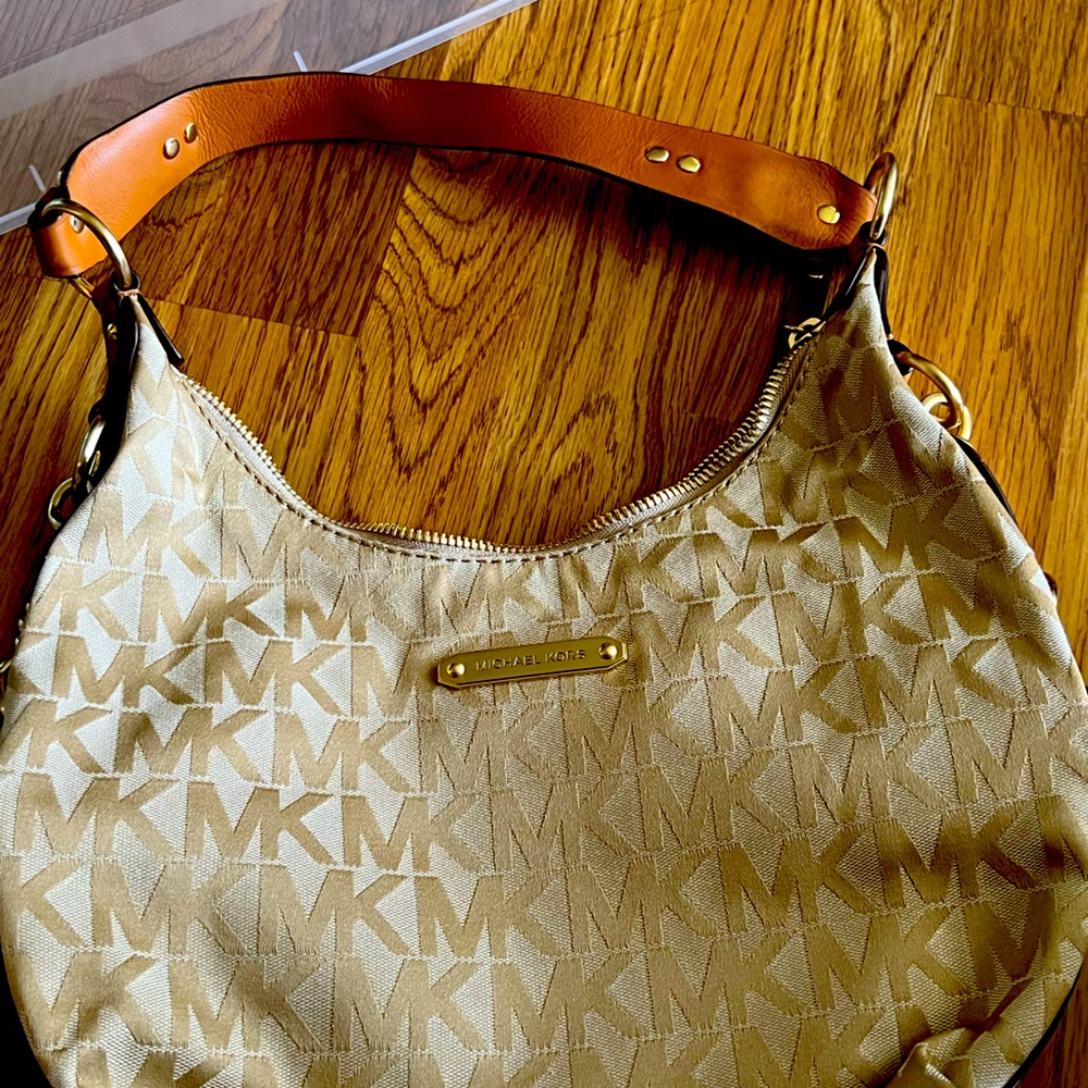 One Micheal Kors shoulder w/MK logo fabric and genuine leather strap and details